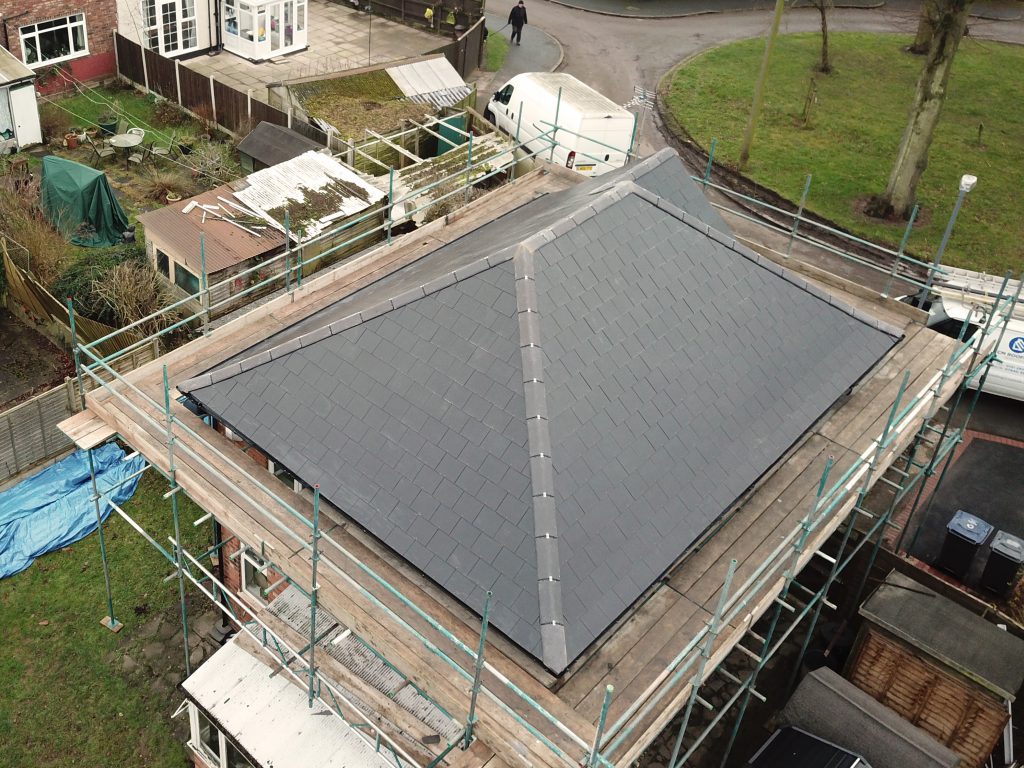 Arial view of a new roof taken by drone.
